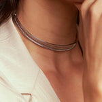 GARGANTILHA ARO CURVO VAZADO TEXTURIZADO