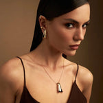 BRINCO CURVO TRABALHADO E LISO