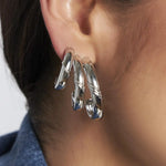 MEIA ARGOLA DE TRÊS VOLTAS LISAS BANHADO A RÓDIO