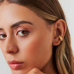 PIERCING DE ORELHA UNITÁRIO CURVO E TEXTURIZADO