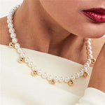 COLAR COM PÉROLAS E ESFERAS